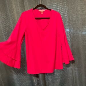 Pink bell sleeves